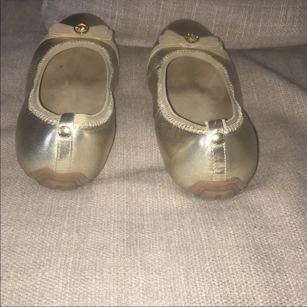 Michael Kors gold “Rover Lux” flats